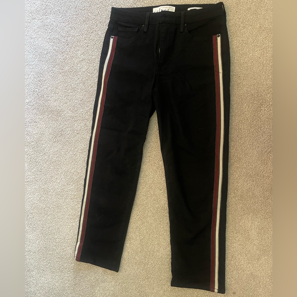 Black jeans with sparkly red and white stripe down side